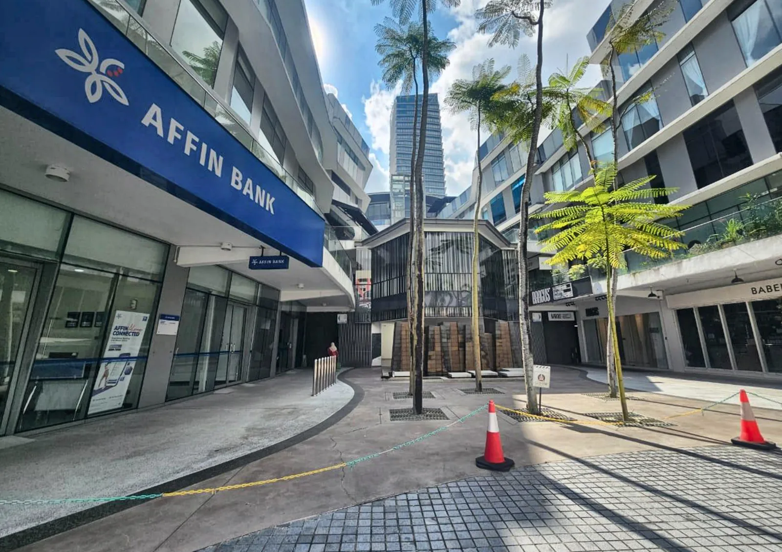 Affin Bank on your left: walk straight ahead to find the lift