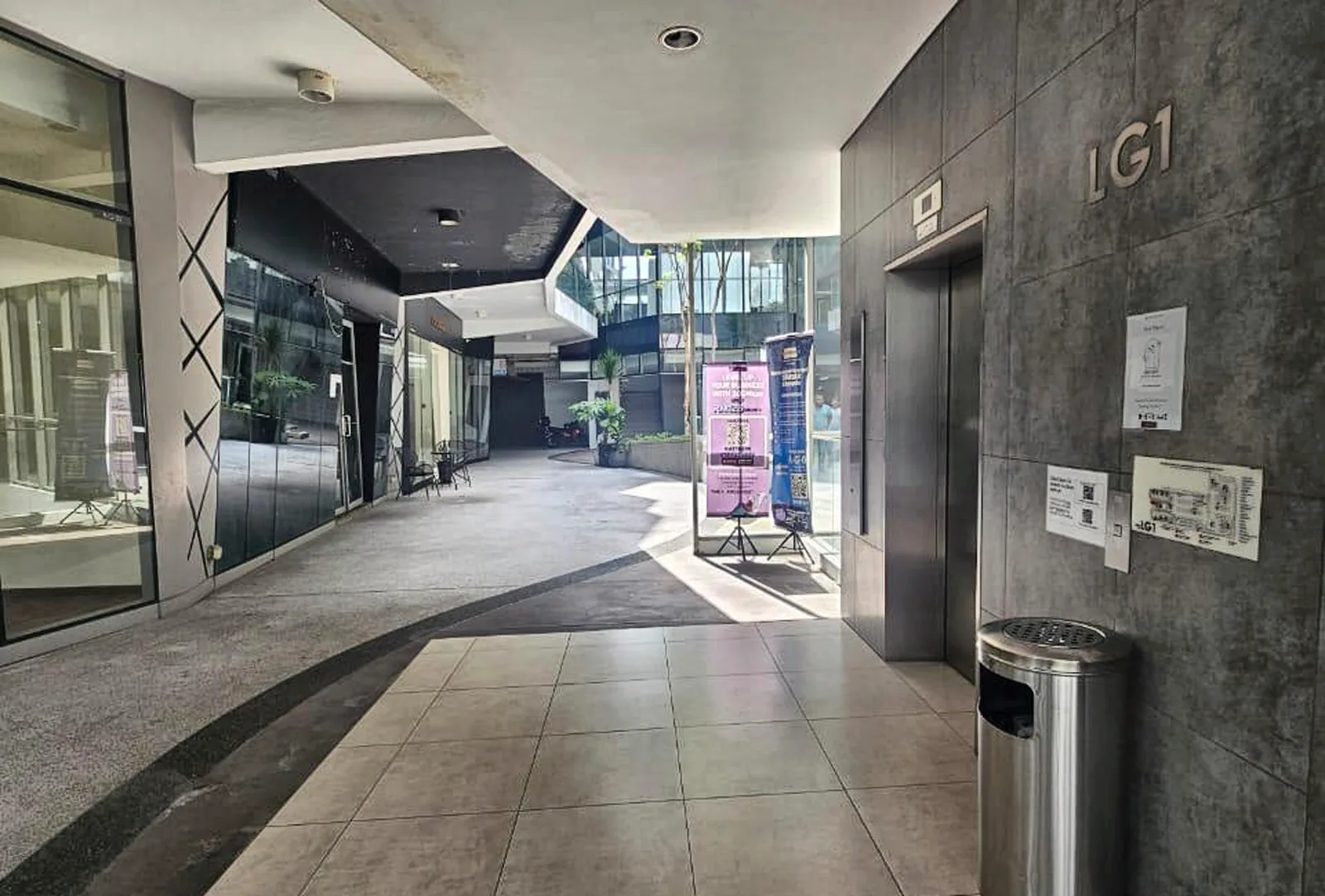 The LG1 lift lobby, with the lift on the right and the hallway ahead